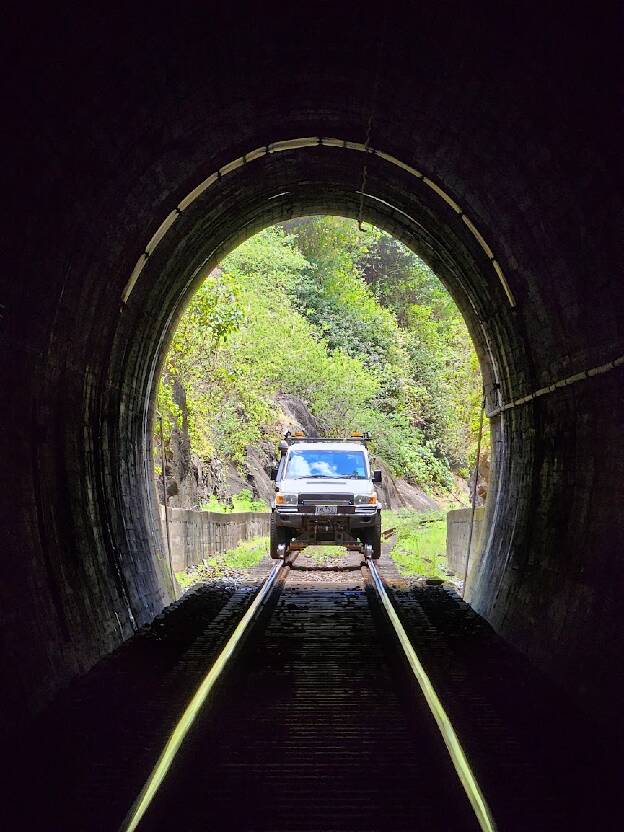 The high-rail landcruiser peering down the tunnel